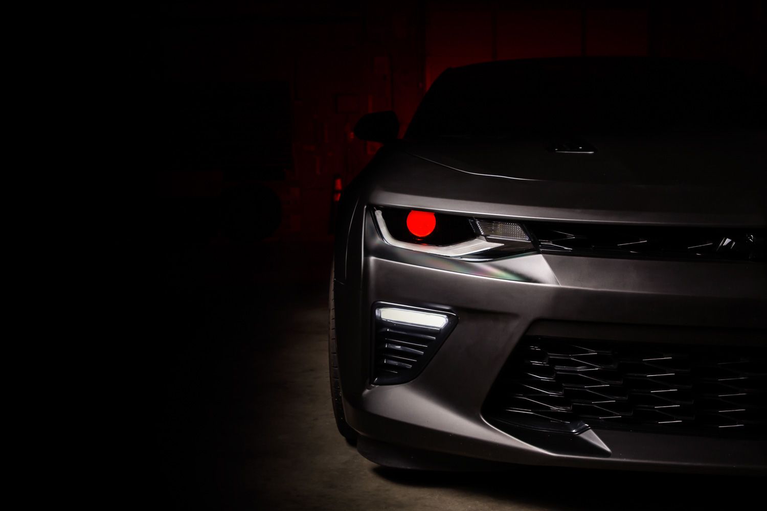Pro Series RGBW Demon Eyes installed in a projector headlight
