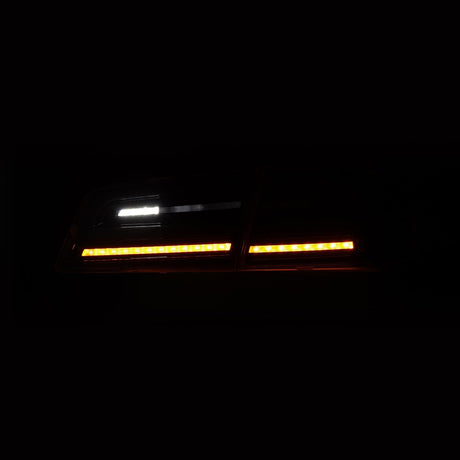 12-21 Tesla Model S LUXX-Series LED Tail Lights Black Smoke (With Black Trunk Center Piece Replacement)