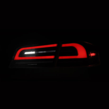 12-21 Tesla Model S LUXX-Series LED Tail Lights Black Smoke (With Black Trunk Center Piece Replacement)