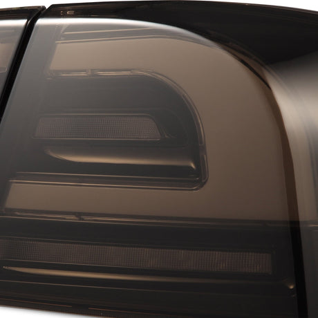 12-21 Tesla Model S LUXX-Series LED Tail Lights Black Smoke (With Black Trunk Center Piece Replacement)